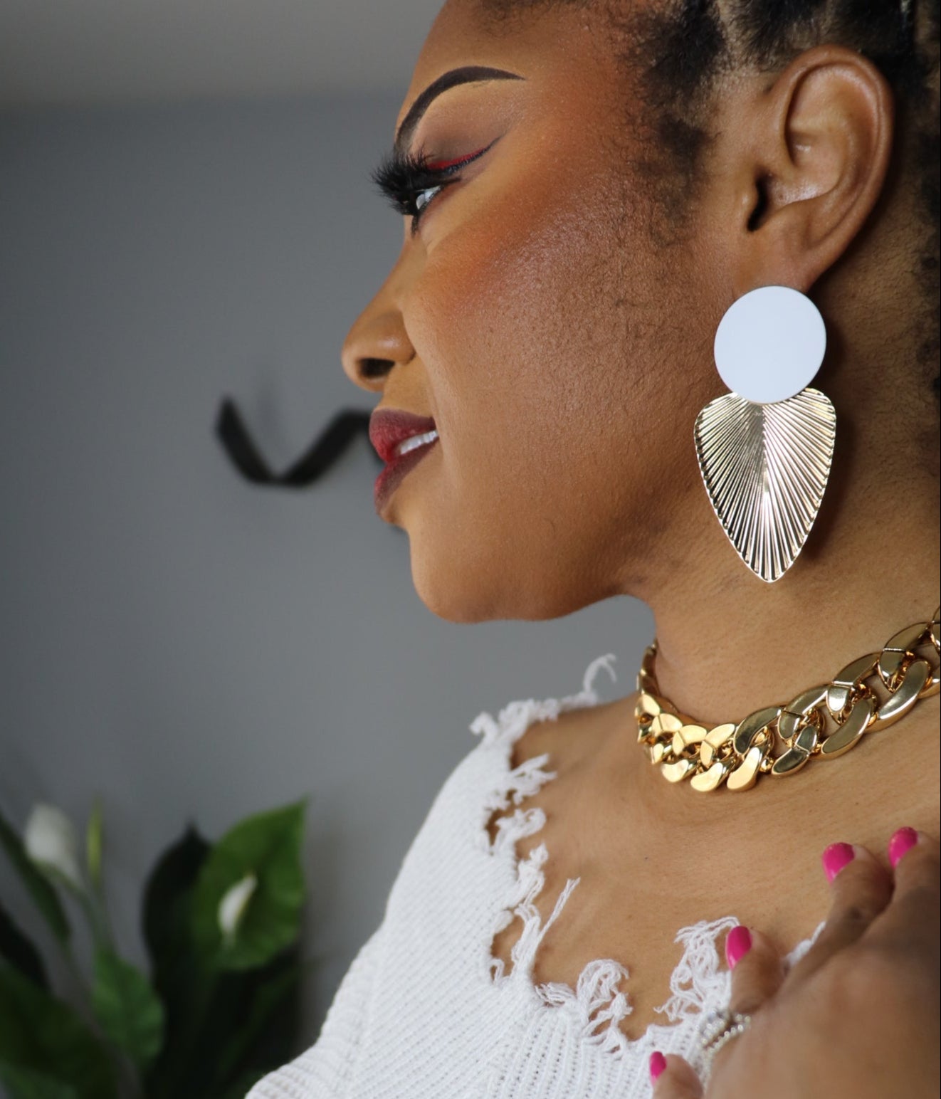woman wearing luxury gold-plated chunky chain necklace with polished finish from Adrienne Rebecca Boutique