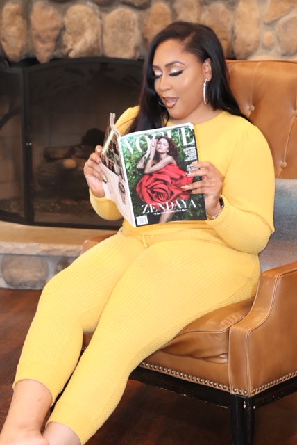 Plus sixe model wearing mustard 2-piece jogger set with long sleeve top from Adrienne Rebecca Boutique