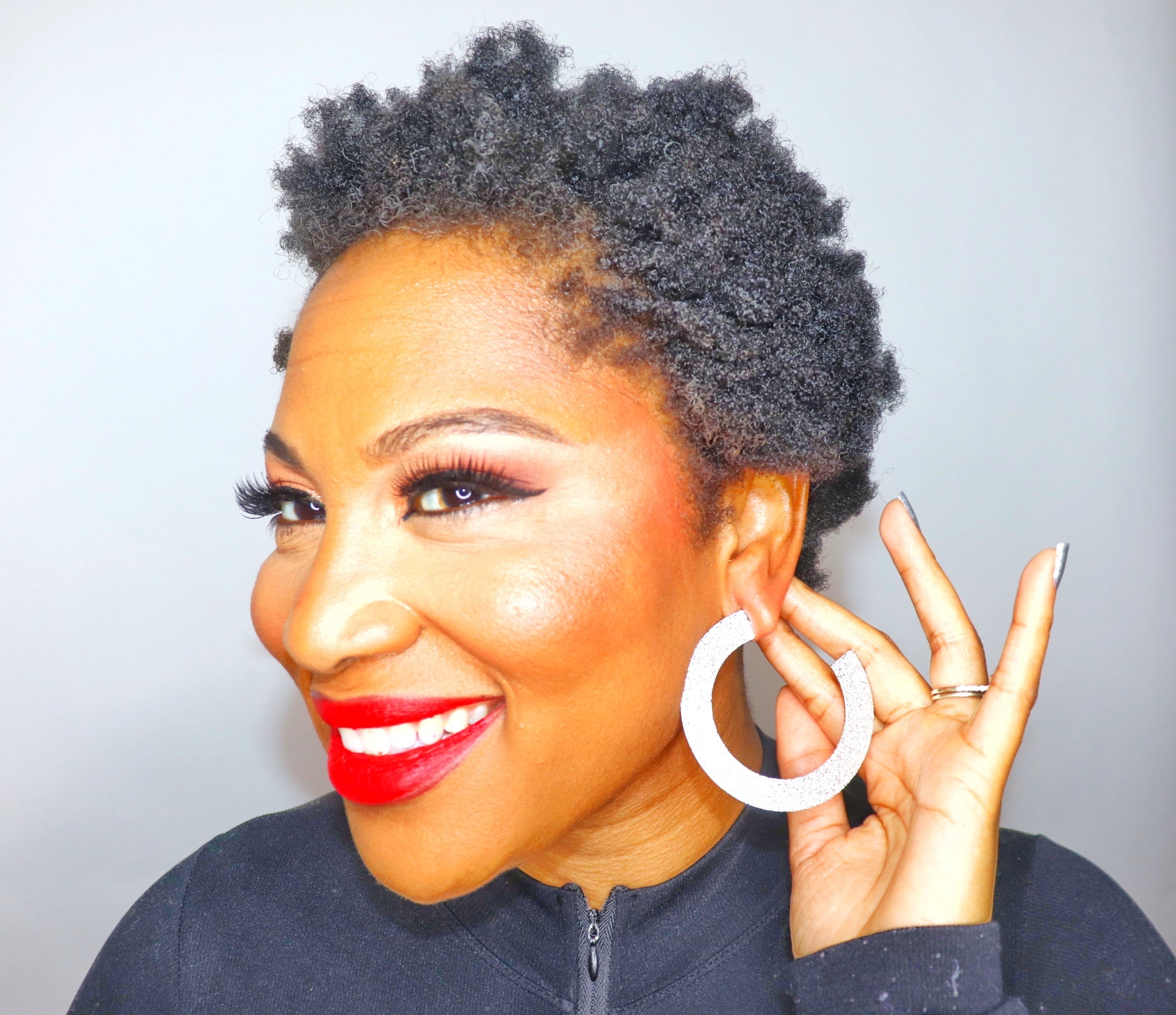 Gold and silver flat hoop earrings with post back from Adrienne Rebecca Boutique

